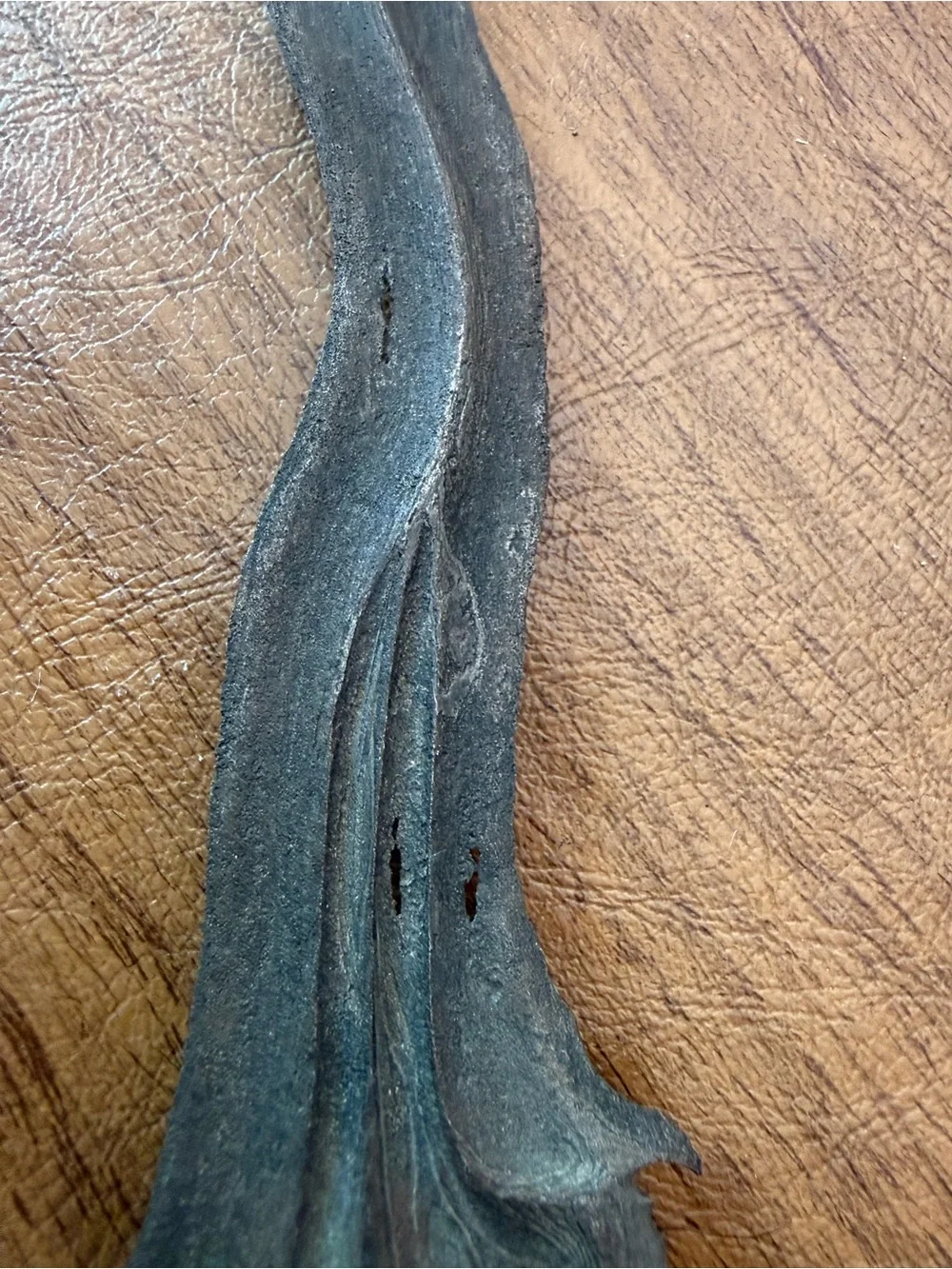 Antique Keris a traditional asymmetrical dagger with a wavy blade from Indonesia